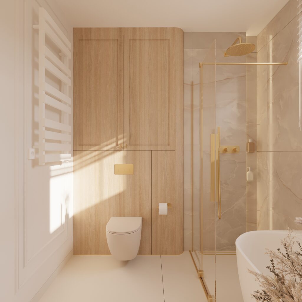 łazienka 2b (1) Na pierwszym planie widoczny jest geberit. Ściana ta jest cała z drewna, gdzie zostały ukryte półki. Po prawej stronie jest prysznic ze złotą armaturą i deszczownicą. Prysznic jest oszklony i elegancki. Pomieszczenie w ciepłych kolorach, wygląda bardzo estetycznie i elegancko.