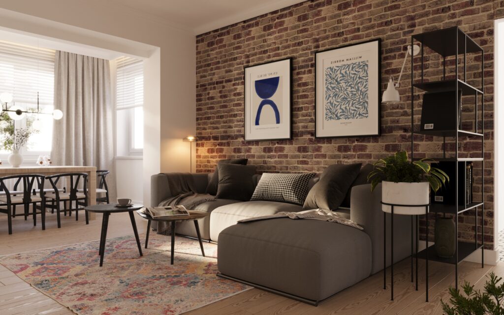 salon z jadalnia 1a (1) Na zdjęciu znajduje się wizualizacja salonu z jadalnią. Na ścianie jest cegła, a na pierwszym planie jest ogromna sofa szara z czarnymi dodatkami. Na podłodze są panele. Przed sofą stoją dwa stoliki kawowe. Obok sofy stoi czarny regał na książki oraz kwiatek. Nad sofą wiszą abstrakcyjne grafiki w czarnej ramie. Dalej widoczny jest fragment stołu z lampą, która nad nim wisi. Jest dużo okien. Na podłodze leży dywan, który wygląda na stary.