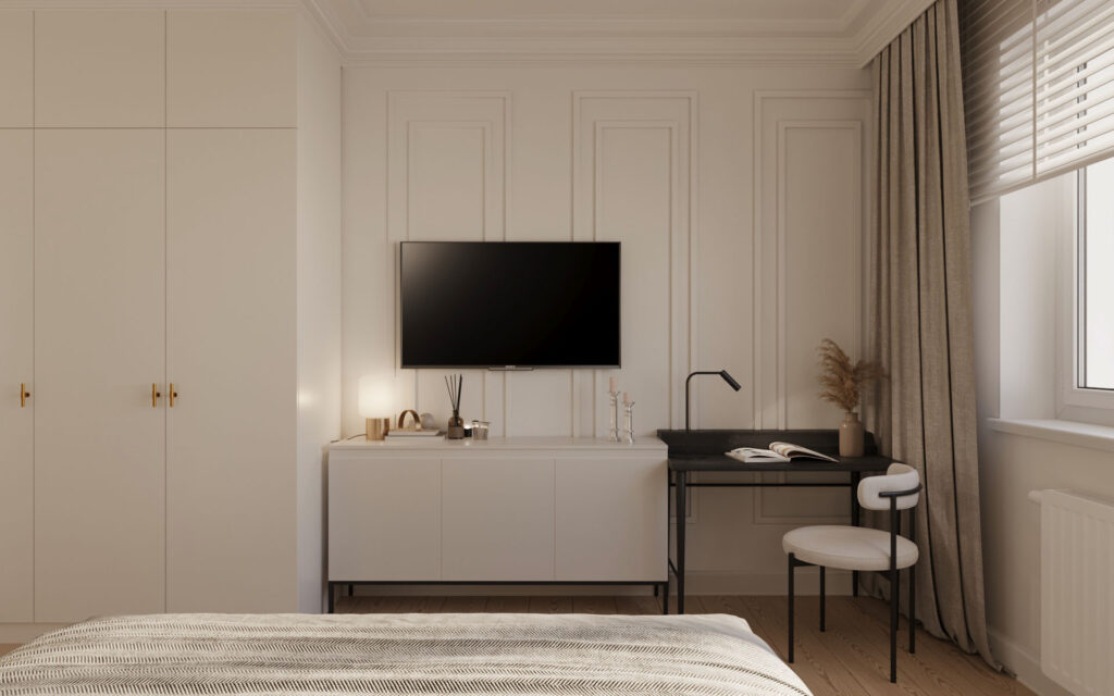 sypialnia 1b kopia Na wizualizacji jest sypialnia. Po prawej stronie jest duże okno z białymi roletami oraz kaloryferem. Naprzeciwko jest ogromny wiszącycy telewizor. Pod nim jest szafka, która dalej połączona jest z biurkiem - miejscem do pracy. Obok telewizoraz jest ogromna szafa, która jest niemal niewidoczna. Na ścianach są ozdobne dekory.